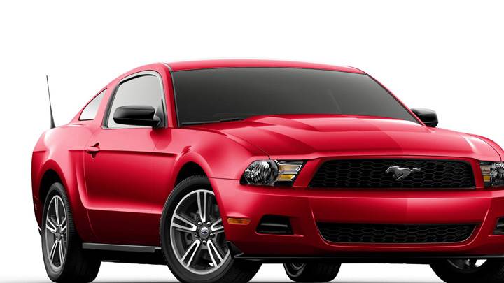 Front Side Pose Of 2011 Ford Mustang V6 In Red N White Background